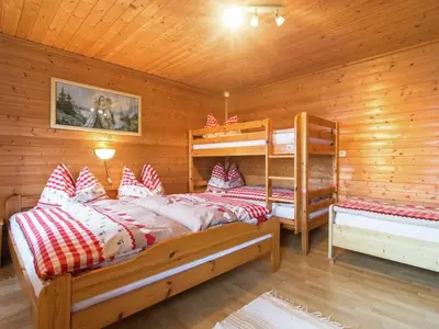 Ein Bett oder Betten in einem Zimmer der Unterkunft Farmhouse in St Johann with Sauna