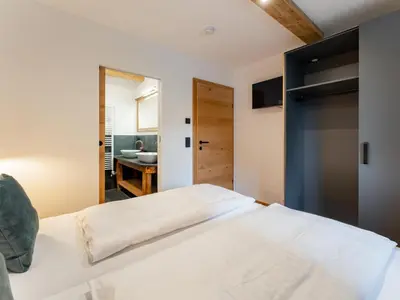 Ein Bett oder Betten in einem Zimmer der Unterkunft AlmApARTment Mauterndorf Pichl 7-1
