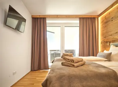Ein Bett oder Betten in einem Zimmer der Unterkunft The Spa Suite Top 3- Tauplitz Residences by AAHH