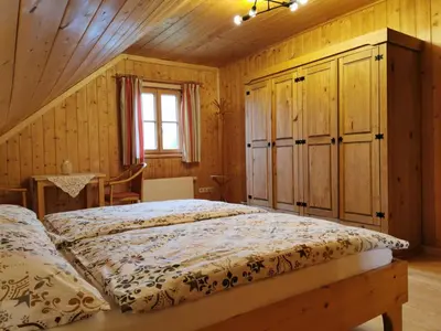 Ein Bett oder Betten in einem Zimmer der Unterkunft Ferienhaus Rosl am Grundlsee