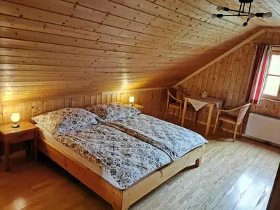 Ein Bett oder Betten in einem Zimmer der Unterkunft Ferienhaus Rosl am Grundlsee