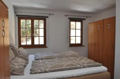 Ein Bett oder Betten in einem Zimmer der Unterkunft Apartments-Weberlandl