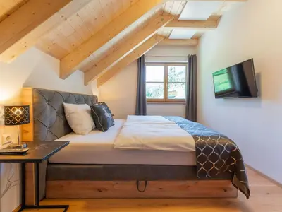 Ein Bett oder Betten in einem Zimmer der Unterkunft Apart Heidi