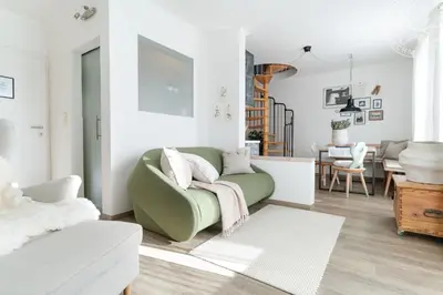 Ein Sitzbereich in der Unterkunft Appartements Lärchmoos