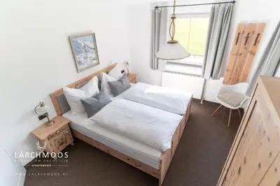 Ein Bett oder Betten in einem Zimmer der Unterkunft Appartements Lärchmoos