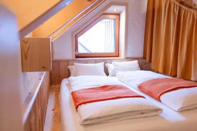Ein Bett oder Betten in einem Zimmer der Unterkunft Ecologie Grundlsee