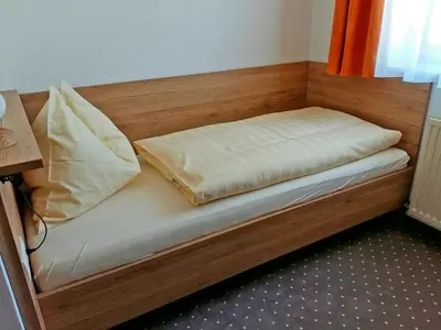 Ein Bett oder Betten in einem Zimmer der Unterkunft Haus Hamburg