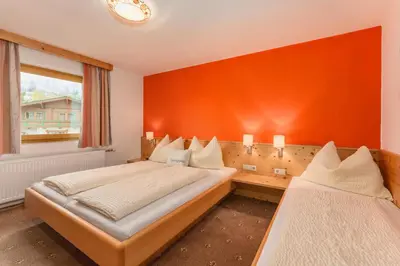 Ein Bett oder Betten in einem Zimmer der Unterkunft Gästehaus Sieder by Schladming-Appartements