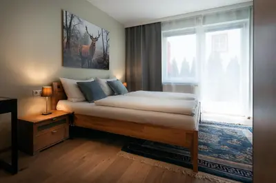 Ein Bett oder Betten in einem Zimmer der Unterkunft Ski-In/Ski-Out Appartements Augasse by Schladming-Appartements