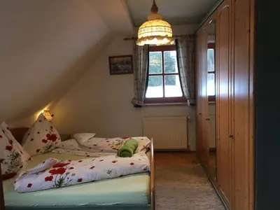 Ein Bett oder Betten in einem Zimmer der Unterkunft Bio-Bauernhof Anawander