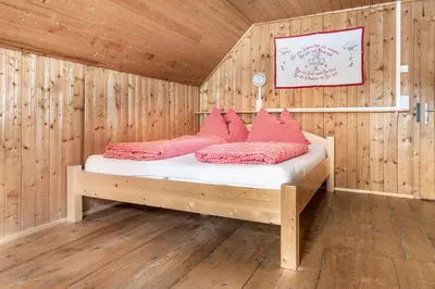 Ein Bett oder Betten in einem Zimmer der Unterkunft Hauserlhütte