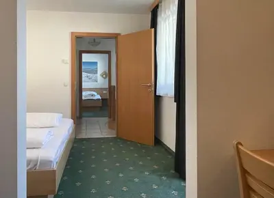 Ein Bett oder Betten in einem Zimmer der Unterkunft Apartment Heijerhof - Top 4