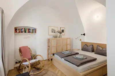 Ein Bett oder Betten in einem Zimmer der Unterkunft Marktplatz-Residenz - 110 m vom Traunsee