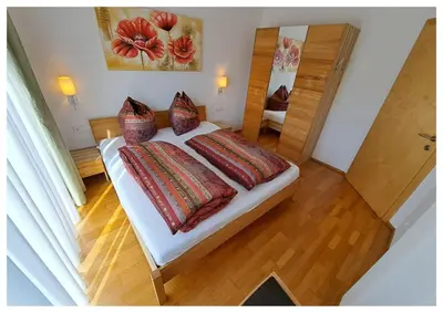 Ein Bett oder Betten in einem Zimmer der Unterkunft Laerchenlodge