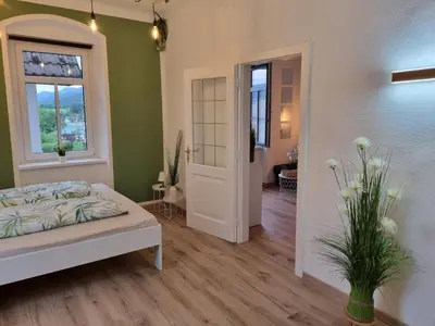 Ein Bett oder Betten in einem Zimmer der Unterkunft Apartment Seebachhof