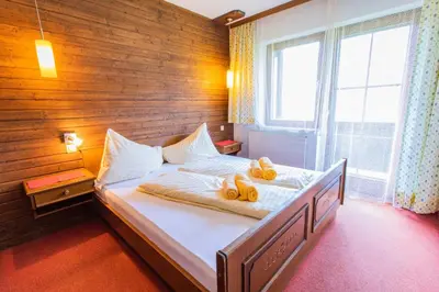 Ein Bett oder Betten in einem Zimmer der Unterkunft Huberhof 6 by Alpenidyll Apartments