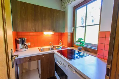 Küche/Küchenzeile in der Unterkunft Huberhof 8 by Alpenidyll Apartments