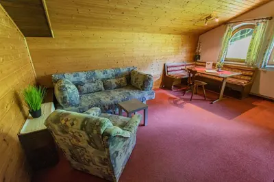 Ein Sitzbereich in der Unterkunft Huberhof 11 by Alpenidyll Apartments