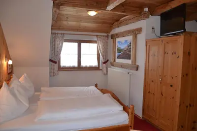 Ein Bett oder Betten in einem Zimmer der Unterkunft Holdhof