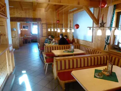 Ein Restaurant oder anderes Speiselokal in der Unterkunft Putterer Stadl