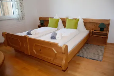 Ein Bett oder Betten in einem Zimmer der Unterkunft Haus Alexander