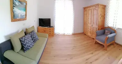 Ein Sitzbereich in der Unterkunft Haus Alexander