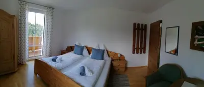 Ein Bett oder Betten in einem Zimmer der Unterkunft Haus Alexander