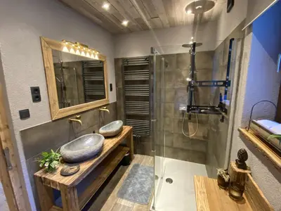 Ein Badezimmer in der Unterkunft Chalet am Weißenbach