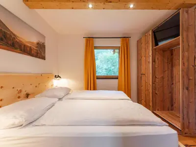 Ein Bett oder Betten in einem Zimmer der Unterkunft AlmApARTment Mauterndorf Pichl 9-3