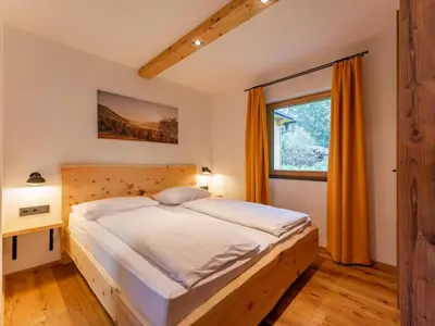 Ein Bett oder Betten in einem Zimmer der Unterkunft AlmApARTment Mauterndorf Pichl 9-3