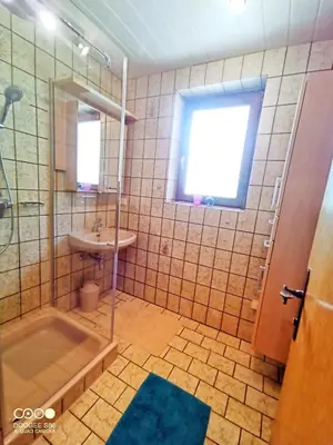 Ein Badezimmer in der Unterkunft Haus Grubbach