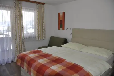Ein Bett oder Betten in einem Zimmer der Unterkunft Haus Kocher