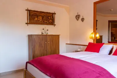 Ein Bett oder Betten in einem Zimmer der Unterkunft Hotel Pension Residence