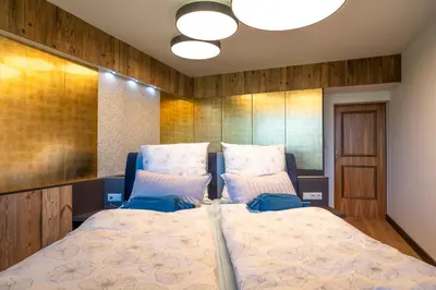Ein Bett oder Betten in einem Zimmer der Unterkunft Wolfgangsee Appartements - Panorama Blick, Parkplatz, Balkon