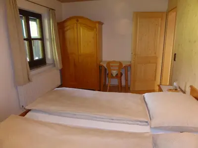 Ein Bett oder Betten in einem Zimmer der Unterkunft Haus Hütter