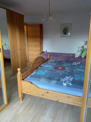 Ein Bett oder Betten in einem Zimmer der Unterkunft Ferienwohnung Kendlbacher
