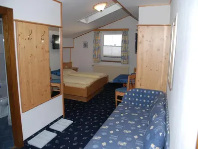 Ein Bett oder Betten in einem Zimmer der Unterkunft Haus Lanner