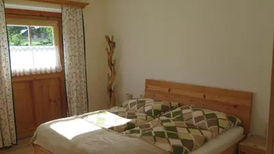 Ein Bett oder Betten in einem Zimmer der Unterkunft Haus Sonja