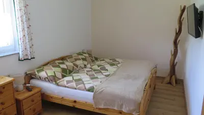 Ein Bett oder Betten in einem Zimmer der Unterkunft Haus Sonja