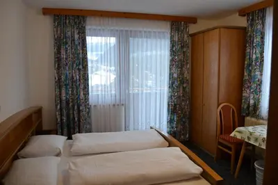 Ein Bett oder Betten in einem Zimmer der Unterkunft Landhaus Buchsteiner