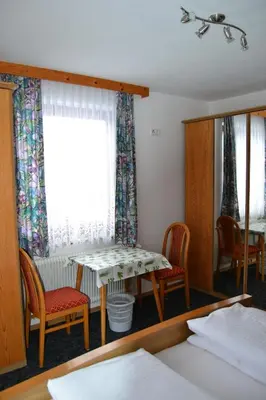Ein Bett oder Betten in einem Zimmer der Unterkunft Landhaus Buchsteiner