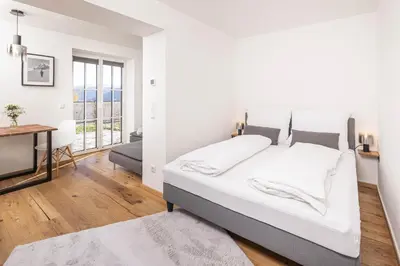 Ein Bett oder Betten in einem Zimmer der Unterkunft Apartment - Lärchenhof