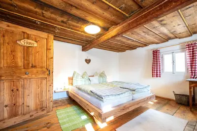 Ein Bett oder Betten in einem Zimmer der Unterkunft Ferienhaus Schwöllerbauer