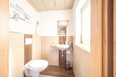 Ein Badezimmer in der Unterkunft Ferienhaus Schwöllerbauer