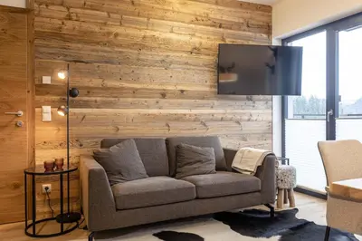 Ein Sitzbereich in der Unterkunft Hideaway Dachstein West by ALPS RESORTS