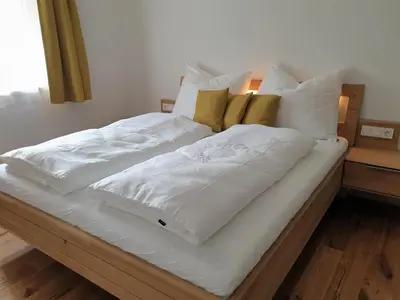Ein Bett oder Betten in einem Zimmer der Unterkunft Appartement Heimatliebe