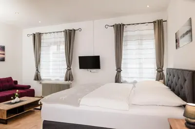 Ein Bett oder Betten in einem Zimmer der Unterkunft Central-Inn Werfen