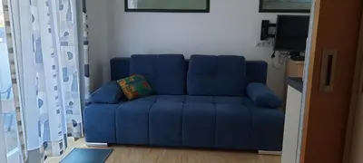 Ein Sitzbereich in der Unterkunft Studio B14