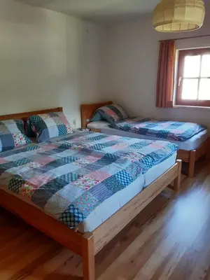 Ein Bett oder Betten in einem Zimmer der Unterkunft Haus Moser