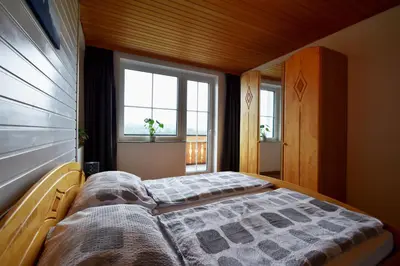 Ein Bett oder Betten in einem Zimmer der Unterkunft Grimmingblick Energiequelle
